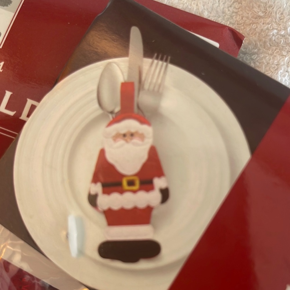 3 set of 4 utensil holders. Jolly Santa